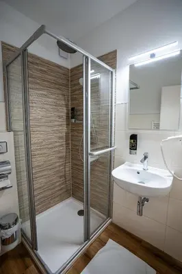 Ein Badezimmer in der Unterkunft besttime Hotel Boppard